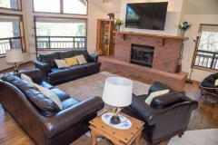 Living-room-looking-toward-fireplace-and-big-windows