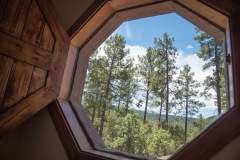 Upstairs-Bedroom-Port-Hole-View